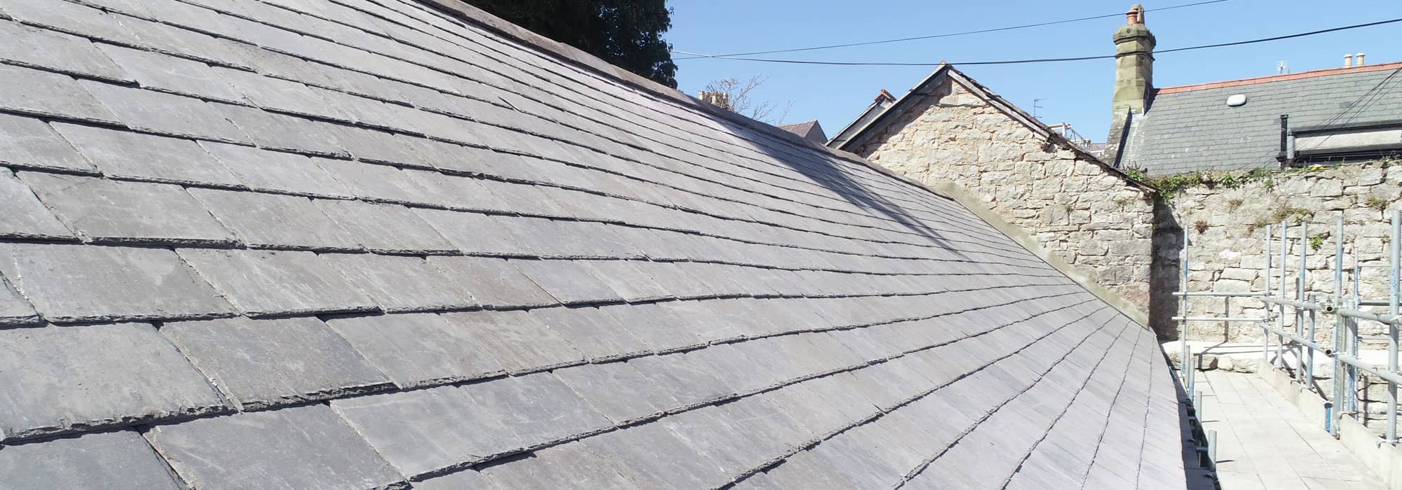 Slated roof repairs at property in Denbighshire